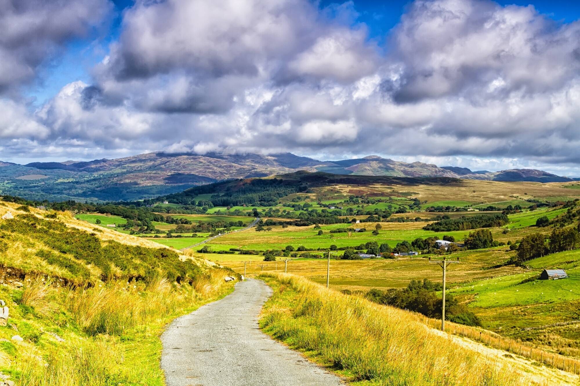 Ss road view to mountains in snowdonia national park in north wales of the united kingdom snowdonia is a mountain range and a region in north of wales europe