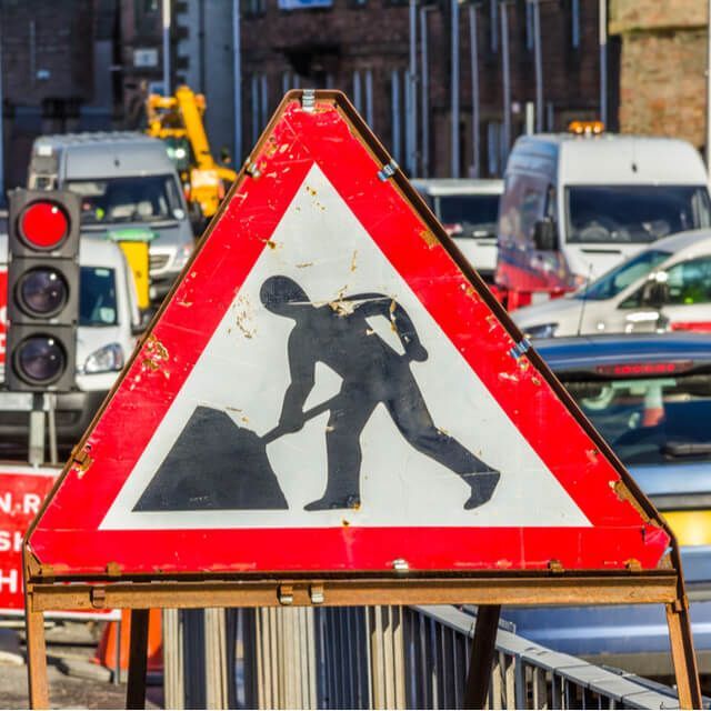 Old Roadworks Sign on a Busy Road in Scotland 640x640
